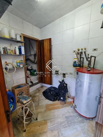 Foto 8 do(a) Casa de 4 quartos à venda em Vila Arapuã, São Paulo