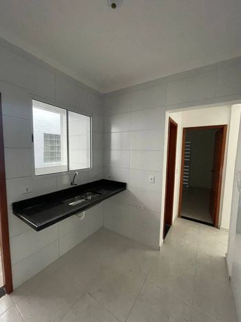 Foto 2 do(a) Casa em Condomínio de 2 quartos à venda em Vila Voturua, São Vicente