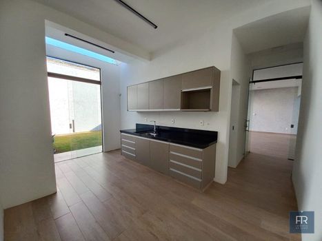 Foto 2 do(a) Casa de 3 quartos à venda em Jardim Karaíba, Uberlândia