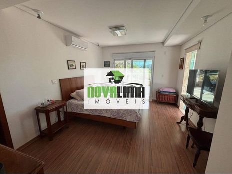 Foto 7 do(a) Casa em Condomínio de 4 quartos à venda em Veredas das Geraes, Nova Lima