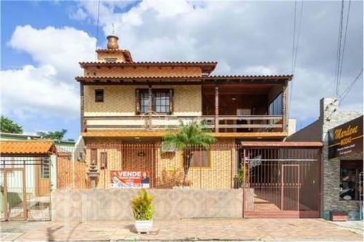 Foto 1 do(a) Casa de 4 quartos à venda em Parque Granja Esperança, Cachoeirinha