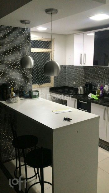Foto 5 do(a) Apartamento de 2 quartos à venda em Vila Monte Carlo, Cachoeirinha