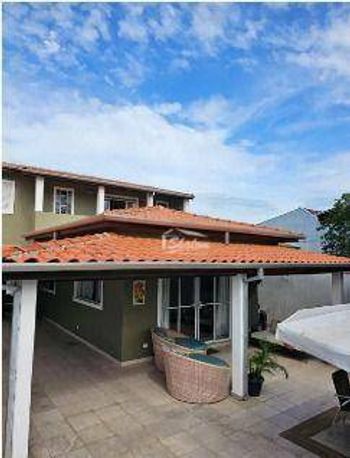 Foto 2 do(a) Casa de 4 quartos à venda em Travessão, Caraguatatuba