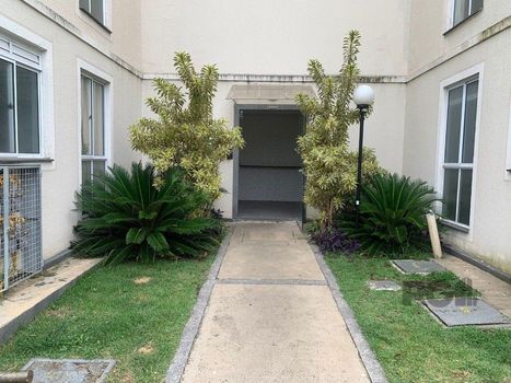 Foto 2 do(a) Flat de 2 quartos à venda em Vila Nova, Porto Alegre