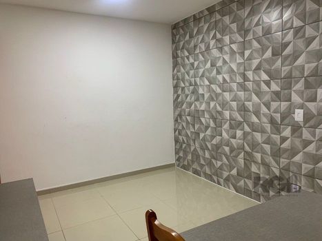 Foto 11 do(a) Flat de 2 quartos à venda em Vila Nova, Porto Alegre