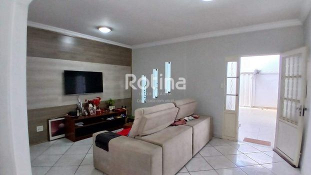 Foto 2 do(a) Casa de 4 quartos à venda em Segismundo Pereira, Uberlândia