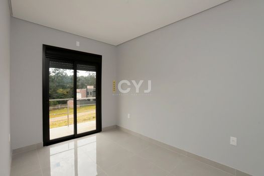 Foto 1 do(a) Casa em Condomínio de 3 quartos à venda em Stella Maris, Alvorada