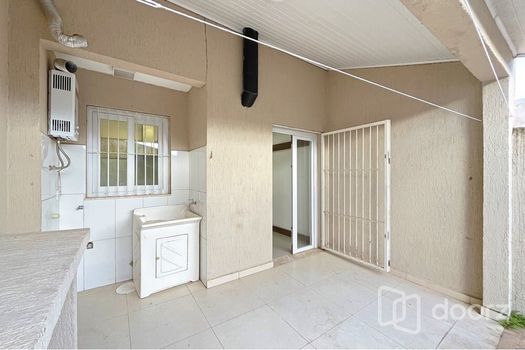 Foto 43 do(a) Casa de 2 quartos à venda em Guarujá, Porto Alegre