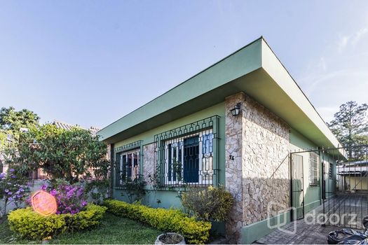 Foto 1 do(a) Casa de 3 quartos à venda em Coronel Aparício Borges, Porto Alegre