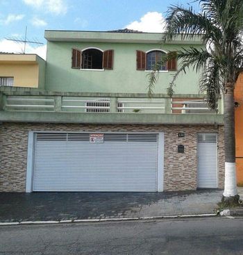 Foto 1 do(a) Casa de 3 quartos à venda em Vila Aquilino, Santo André