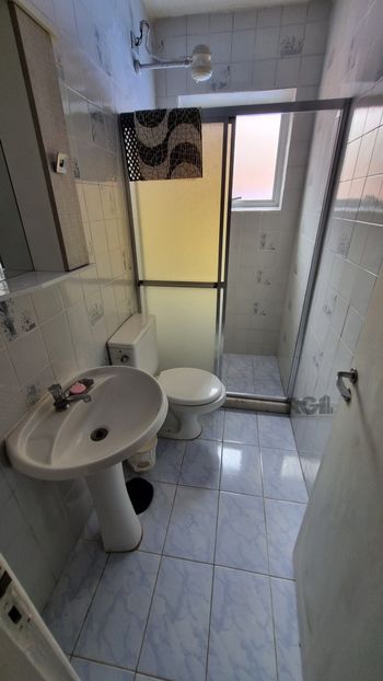 Foto 17 do(a) Casa em Condomínio de 3 quartos à venda em Santo Antônio, Porto Alegre