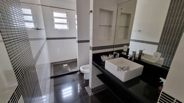 Foto 30 do(a) Casa em Condomínio de 3 quartos à venda em Santo Antônio, Porto Alegre