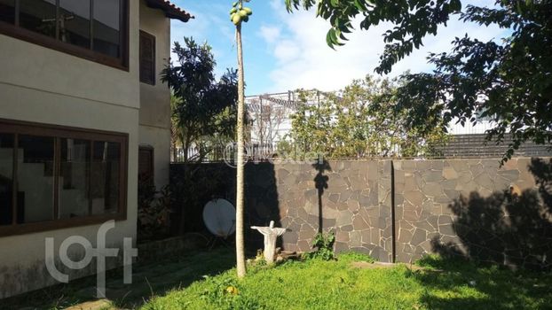 Foto 2 do(a) Casa de 4 quartos à venda em Santa Fé, Gravataí