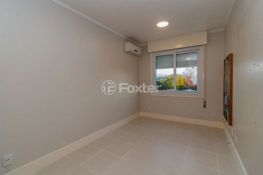 Foto 2 do(a) Apartamento de 1 quartos à venda em Santo Antônio, Porto Alegre