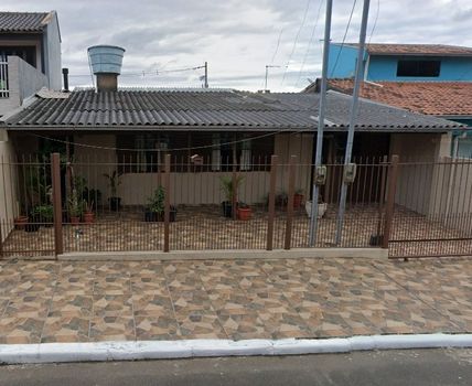 Foto 1 do(a) Casa de 4 quartos à venda em Guajuviras, Canoas