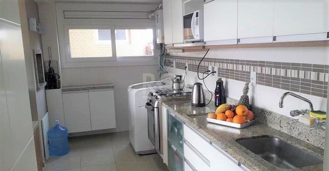 Foto 4 do(a) Flat de 2 quartos à venda em Santo Antônio, Porto Alegre