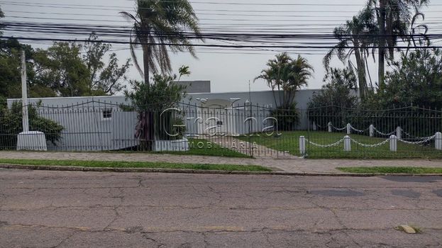 Foto 1 do(a) Casa de 3 quartos à venda em Menino Deus, Porto Alegre