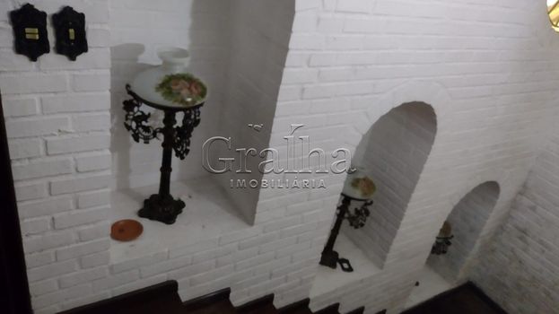 Foto 2 do(a) Casa de 3 quartos à venda em Menino Deus, Porto Alegre