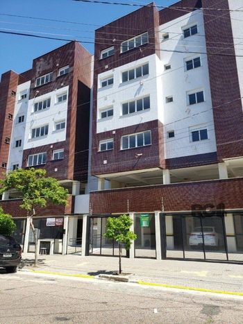Foto 1 do(a) Flat de 2 quartos à venda em Menino Deus, Porto Alegre