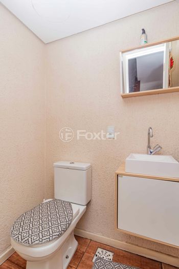Foto 34 do(a) Casa em Condomínio de 3 quartos à venda em Vila Nova, Porto Alegre
