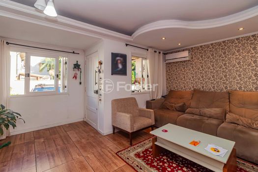 Foto 1 do(a) Casa em Condomínio de 3 quartos à venda em Vila Nova, Porto Alegre