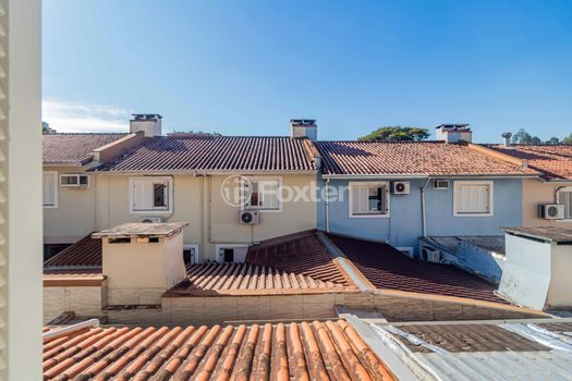 Foto 13 do(a) Casa em Condomínio de 3 quartos à venda em Vila Nova, Porto Alegre