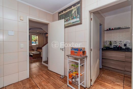 Foto 24 do(a) Casa em Condomínio de 3 quartos à venda em Vila Nova, Porto Alegre