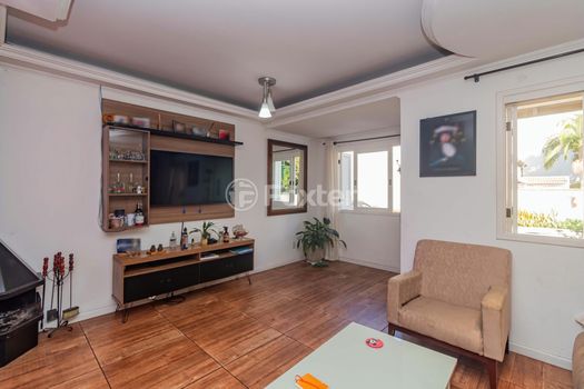 Foto 2 do(a) Casa em Condomínio de 3 quartos à venda em Vila Nova, Porto Alegre