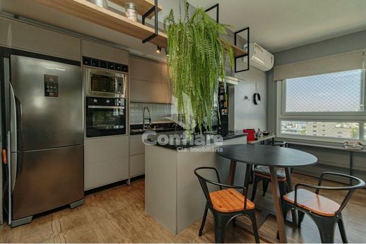 Foto 7 do(a) Apartamento de 2 quartos à venda em Navegantes, Porto Alegre