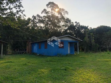 Foto 1 do(a) Fazenda / Sítio / Chácara de 2 quartos à venda em null, Torres