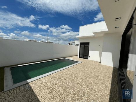 Foto 2 do(a) Casa em Condomínio de 4 quartos à venda em Laranjeiras, Uberlândia