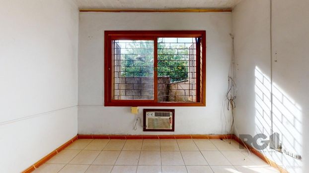 Foto 23 do(a) Casa de 4 quartos à venda em Guarujá, Porto Alegre