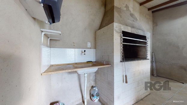 Foto 31 do(a) Casa de 4 quartos à venda em Guarujá, Porto Alegre