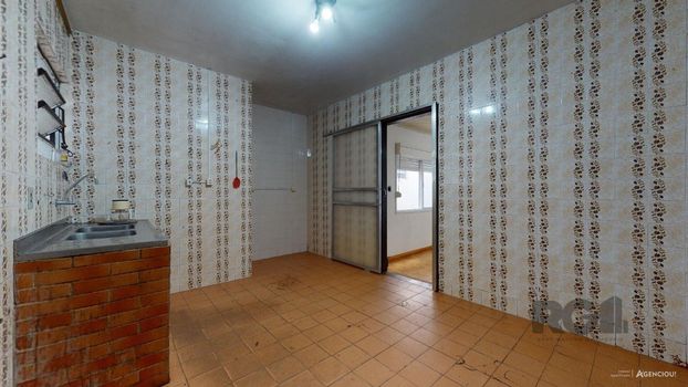 Foto 12 do(a) Casa de 4 quartos à venda em Guarujá, Porto Alegre