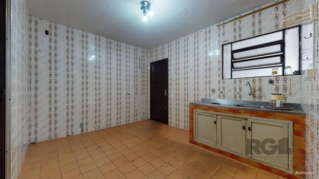 Foto 11 do(a) Casa de 4 quartos à venda em Guarujá, Porto Alegre