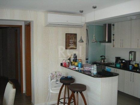Foto 1 do(a) Flat de 2 quartos à venda em Tristeza, Porto Alegre