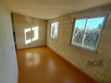 Foto 3 do(a) Flat de 2 quartos à venda em Vila Nova, Porto Alegre