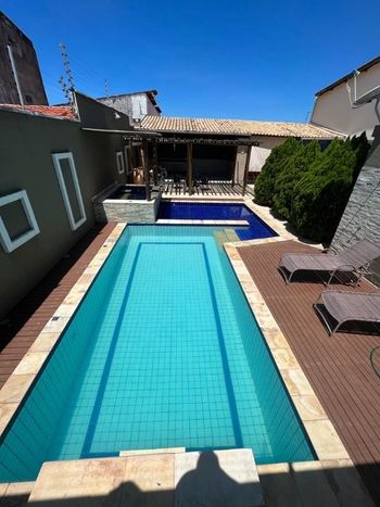 Foto 1 do(a) Casa de 5 quartos à venda em Parque Dois Irmãos, Fortaleza