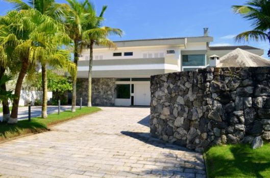 Foto 1 do(a) Casa em Condomínio de 6 quartos à venda em Jardim Acapulco, Guarujá