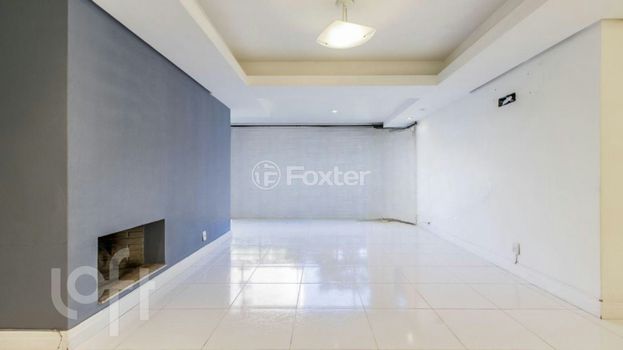 Foto 2 do(a) Apartamento de 3 quartos à venda em Auxiliadora, Porto Alegre