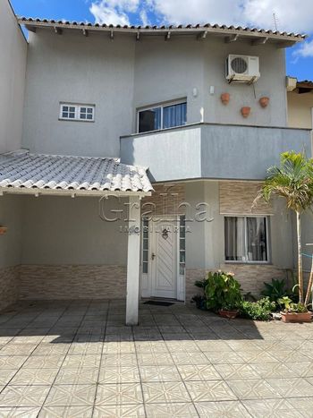 Foto 2 do(a) Casa em Condomínio de 3 quartos à venda em Passo das Pedras, Porto Alegre