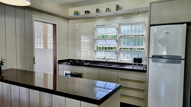 Foto 13 do(a) Apartamento de 4 quartos à venda em Ponta das Canas, Florianópolis