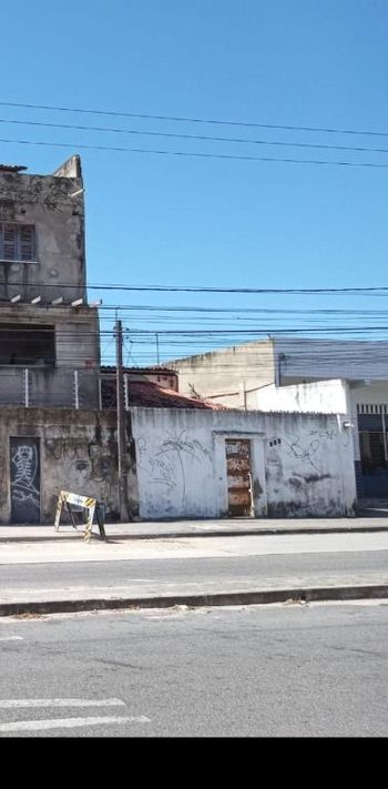 Foto 1 do(a) Casa de 3 quartos à venda em Jóquei Clube, Fortaleza