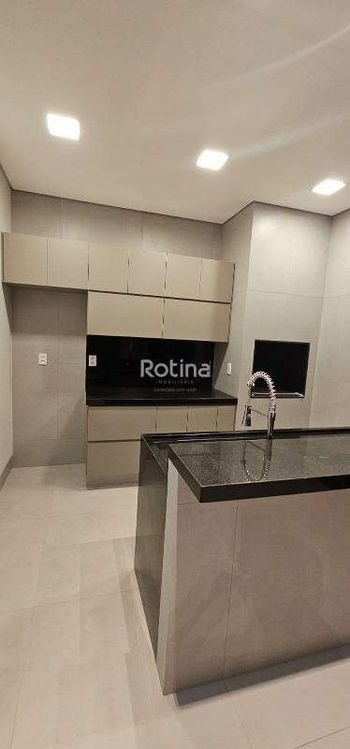 Foto 9 do(a) Casa em Condomínio de 4 quartos à venda em Jardim Inconfidência, Uberlândia