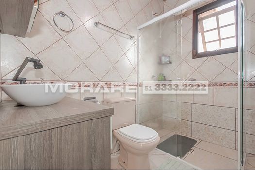Foto 6 do(a) Casa de 4 quartos à venda em Passo da Areia, Porto Alegre