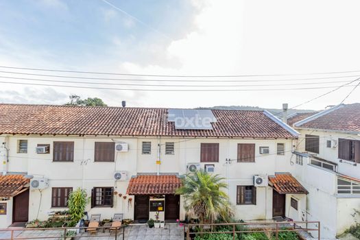 Foto 16 do(a) Casa em Condomínio de 3 quartos à venda em Vila Nova, Porto Alegre