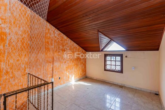 Foto 18 do(a) Casa em Condomínio de 3 quartos à venda em Vila Nova, Porto Alegre