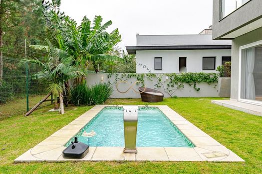 Foto 24 do(a) Casa em Condomínio de 4 quartos para alugar em Vila Nova, Porto Alegre