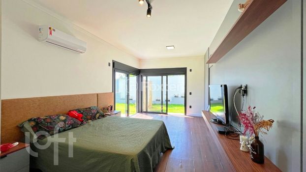 Foto 30 do(a) Casa em Condomínio de 3 quartos à venda em Vila Nova, Porto Alegre