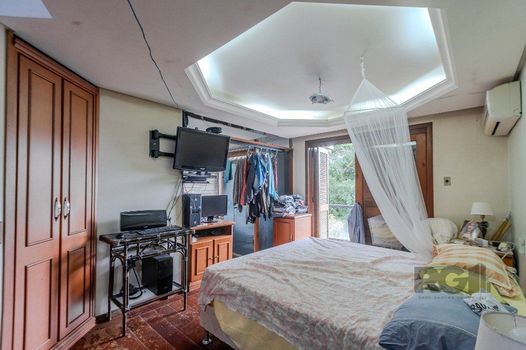 Foto 14 do(a) Casa em Condomínio de 4 quartos à venda em Vila Jardim, Porto Alegre